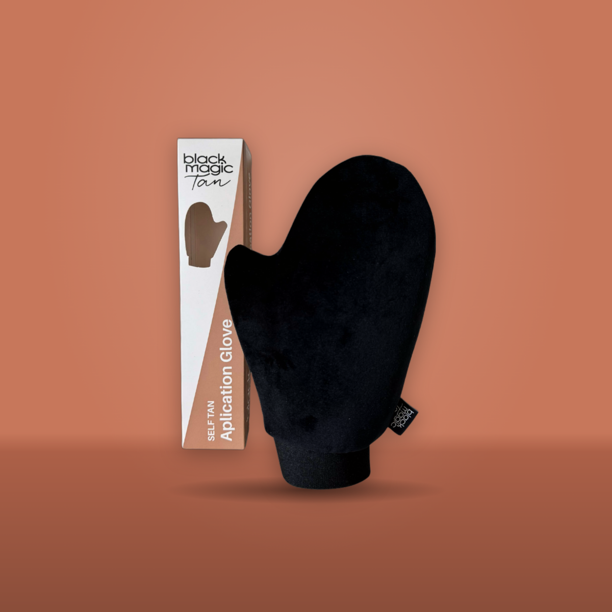 Black Magic Tanning Glove with its box